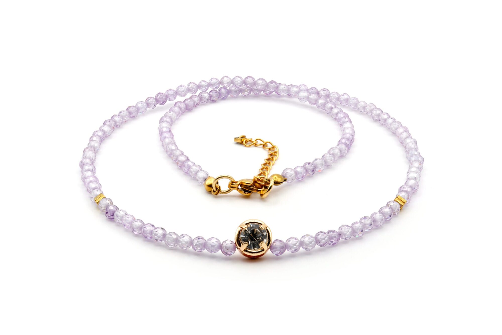 Moteriškas vėrinys su cirkoniu, hematitu ir paauksuotu nerūdijančiu plienu.